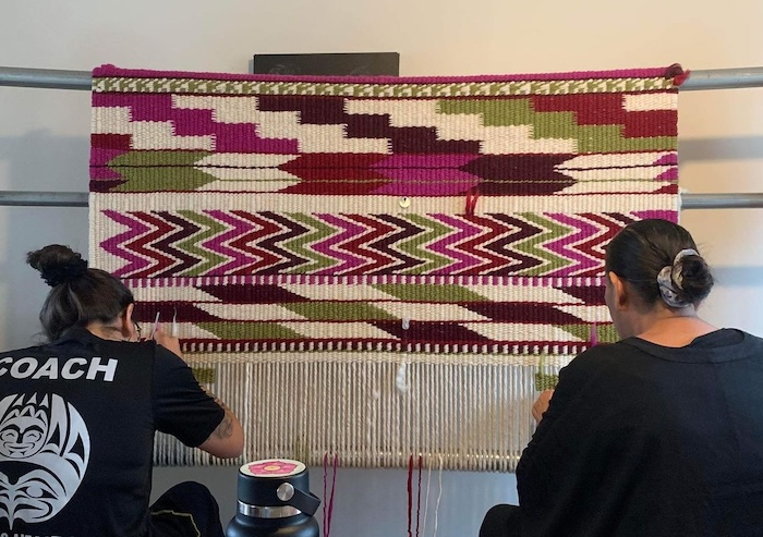 Debra Sparrow and Aleen Sparrow weaving Coast Salish Blanket